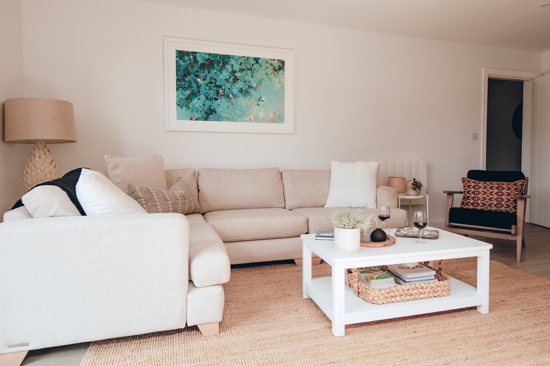 Stylish open-plan lounge with corner sofa at No.9 Putsborough in Woolacombe